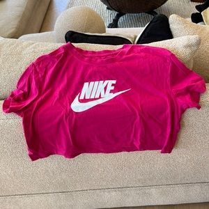 Nike cropped t-shirt photos of the shirt on are for approximatel fit